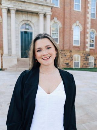 Kathryn Harris in front of Old Main