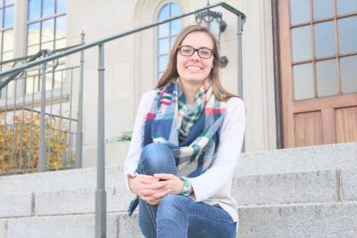 Ashley Morris on the steps of Gearhart Hall