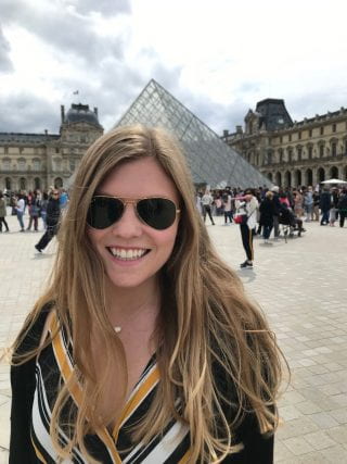 Danica McGrevey in front of the Lourve